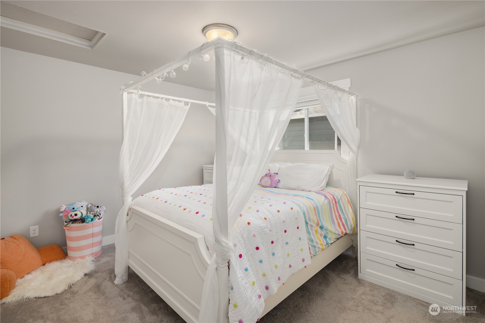 18105 3rd Drive Southeast Bothell, WA 98012 - Photo 16 of 28 a bedroom with a bed and a window