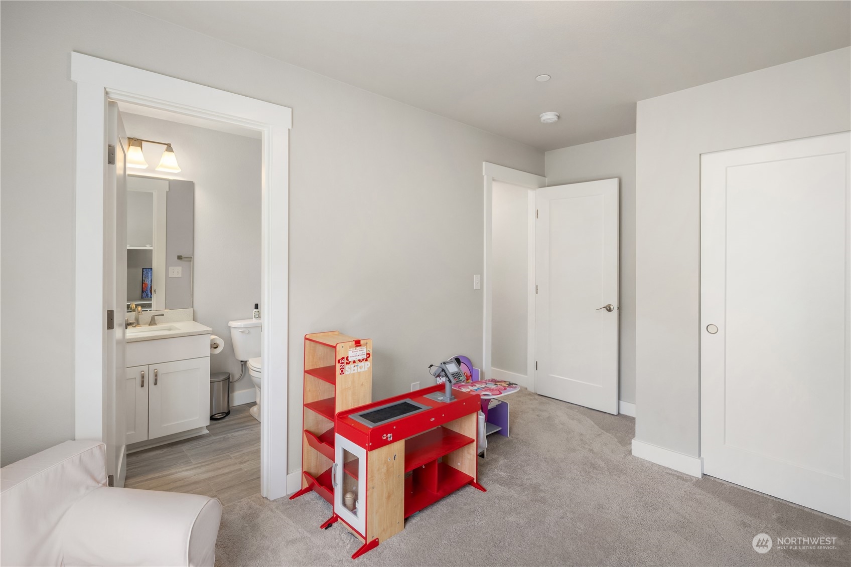 18105 3rd Drive Southeast Bothell, WA 98012 - Photo 19 of 28 a living room with furniture a rug kitchen view and a sink