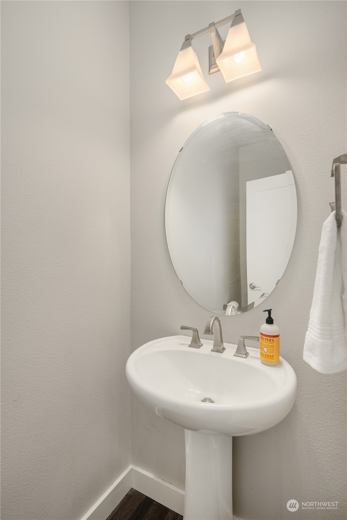 18105 3rd Drive Southeast Bothell, WA 98012 - Photo 24 of 28 a bathroom with a sink a mirror and vanity