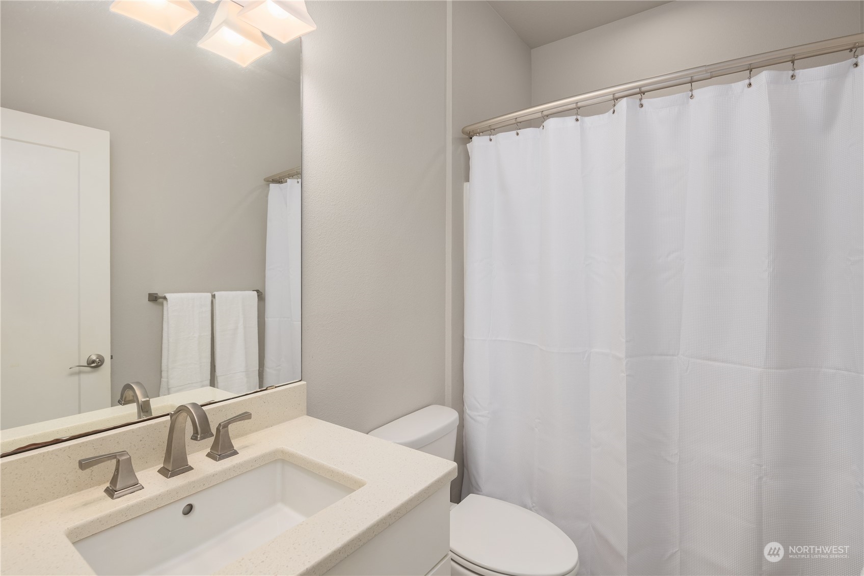 18105 3rd Drive Southeast Bothell, WA 98012 - Photo 27 of 28 a bathroom with a sink and a mirror