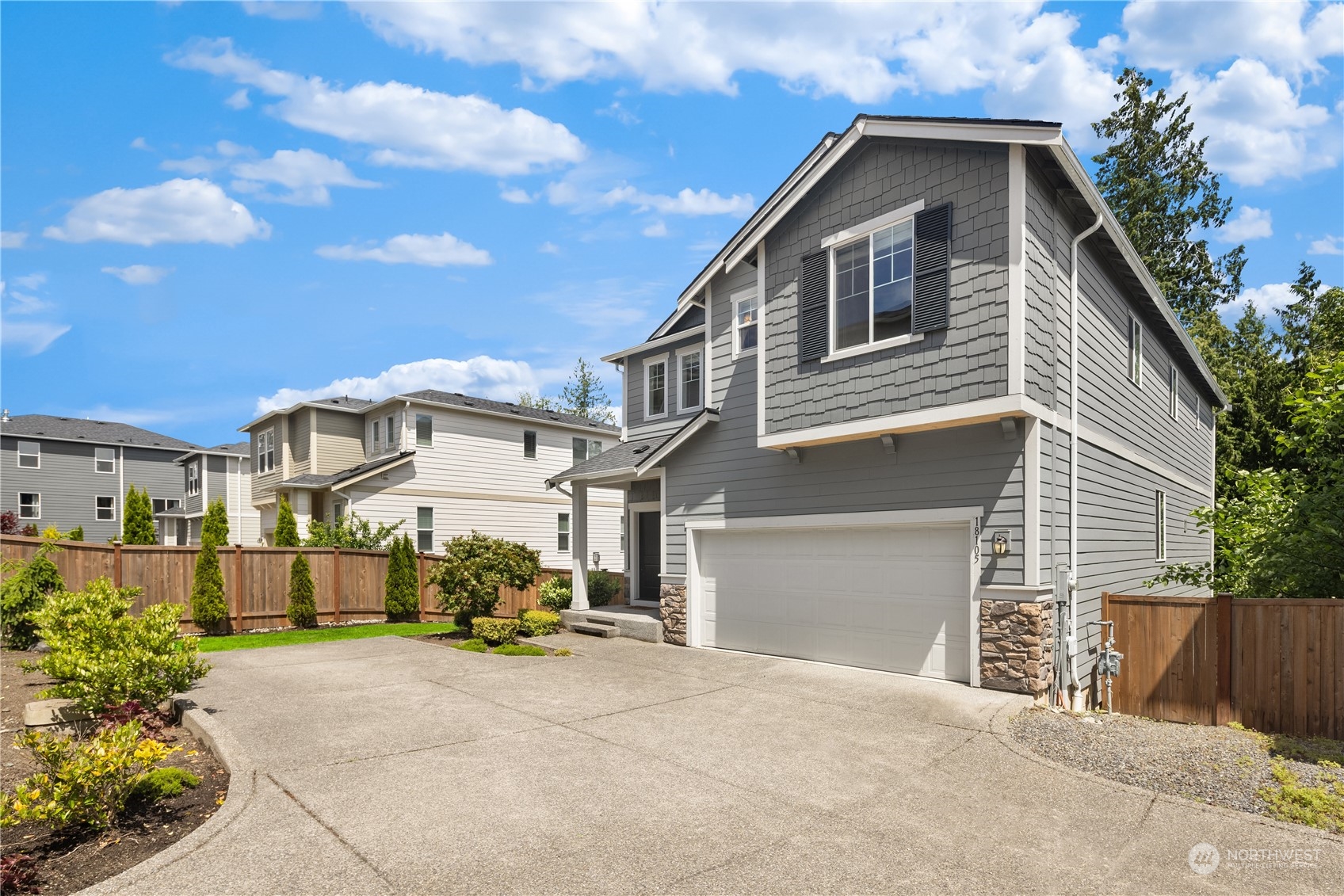 18105 3rd Drive Southeast Bothell, WA 98012 - Photo 28 of 28 a front view of a house with a yard and garage