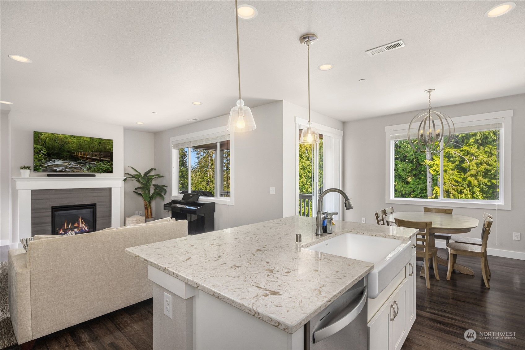 18105 3rd Drive Southeast Bothell, WA 98012 - Photo 5 of 28 a kitchen with a stove a counter space a sink and a fireplace