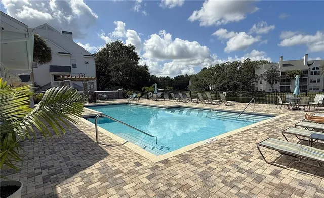 a view of a house with swimming pool