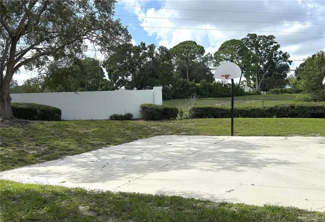 a view of a chairs and table in the patio