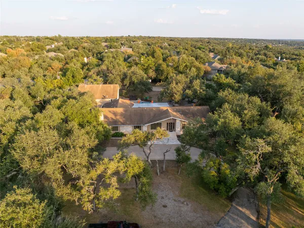 an aerial view of residential house with outdoor space