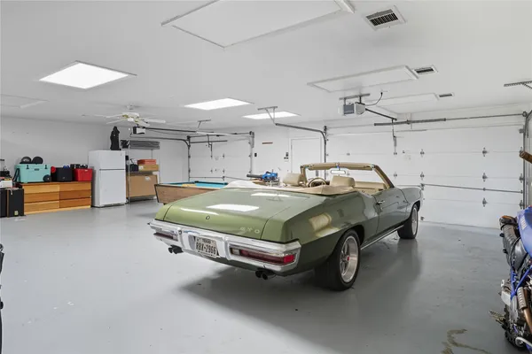 a bedroom with a bed and cabinets