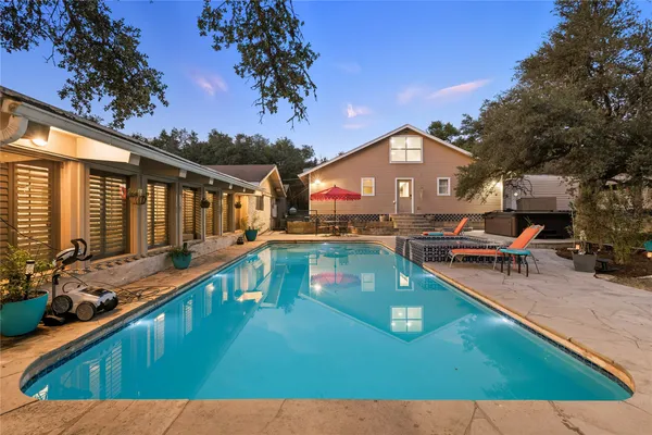 a view of a house with a swimming pool