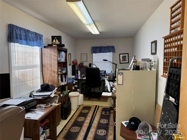 a room with furniture and a window