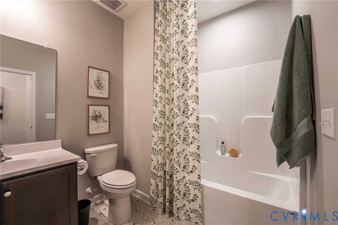 3727 Maze Runner Drive Midlothian, VA 23112 - Photo 28 of 42 a bathroom with a toilet and a bathtub