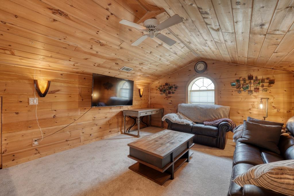 71 Andy Court Morganton, GA 30560 - Photo 17 of 43 a living room with furniture and a flat screen tv