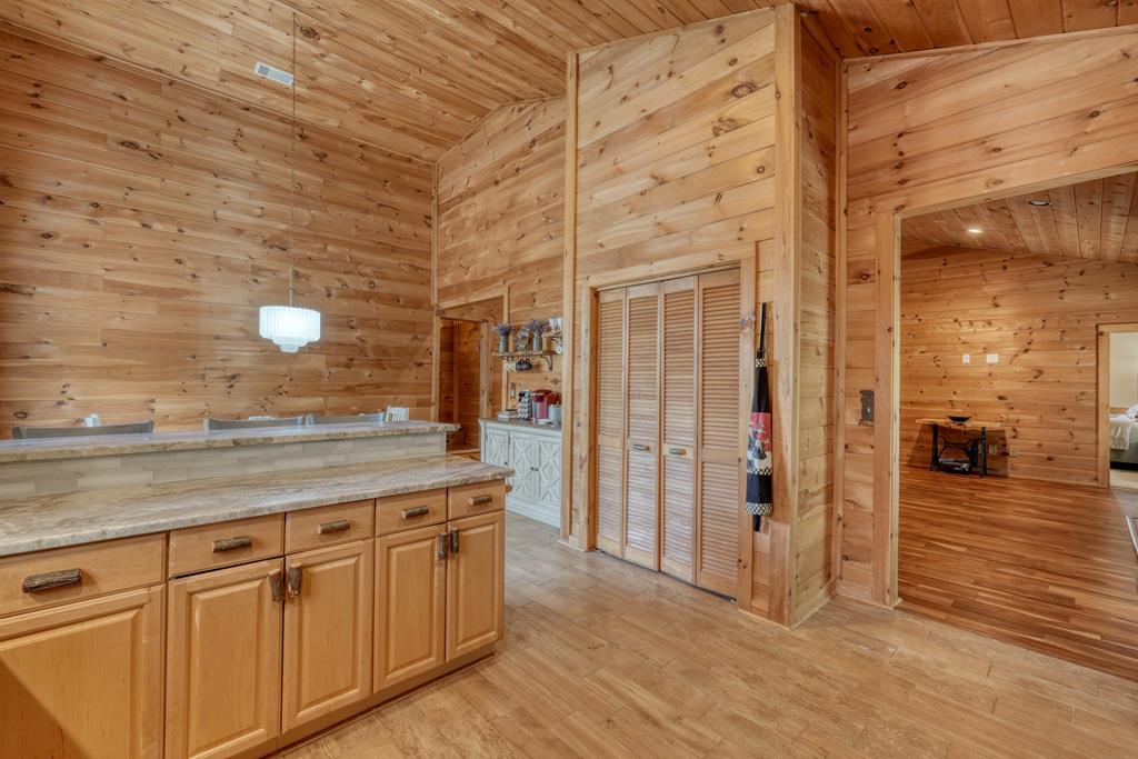 71 Andy Court Morganton, GA 30560 - Photo 10 of 43 a kitchen with stainless steel appliances granite countertop a sink and a wooden cabinets
