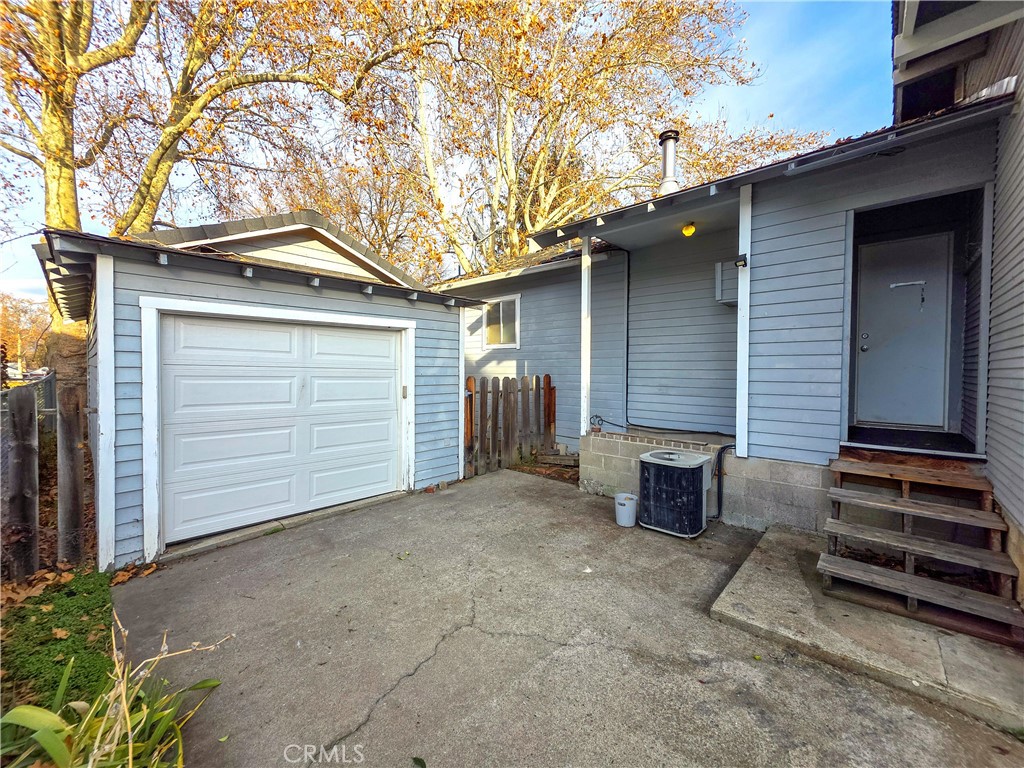614 Lane Yreka, CA 96097 - Photo 33 of 39 a view of a house with a yard and garage