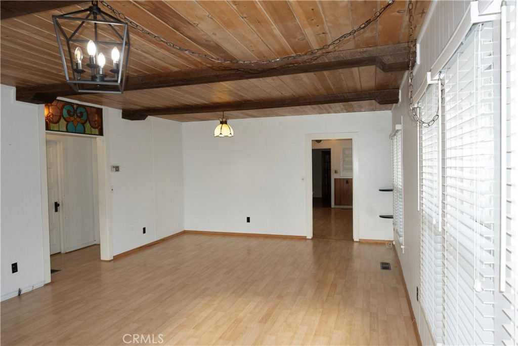 614 Lane Yreka, CA 96097 - Photo 5 of 39 a view of empty room with wooden floor