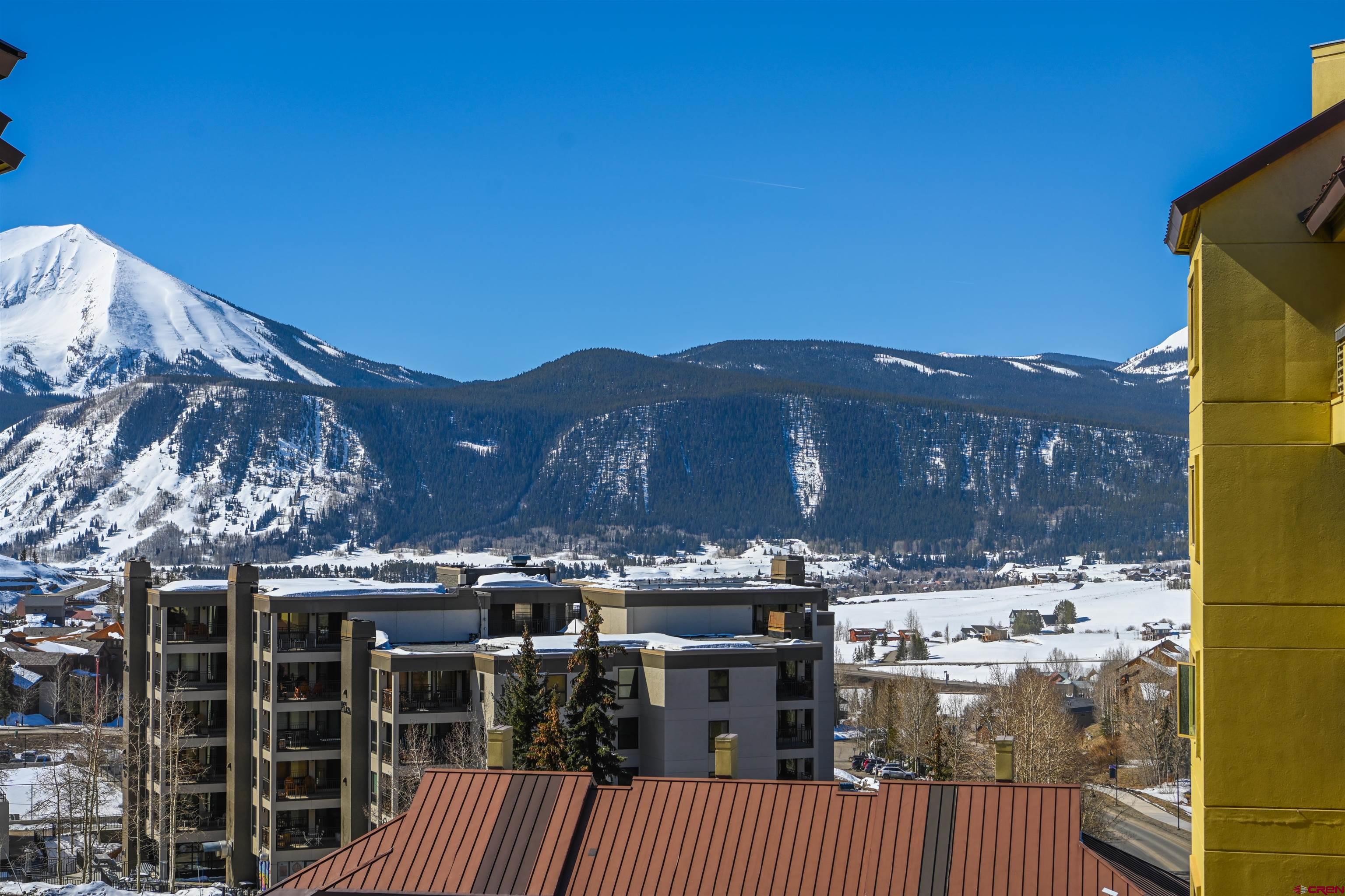 500 Gothic Road, Unit 431 Crested Butte, CO 81225 - Photo 17 of 19 a view of a house with a mountain