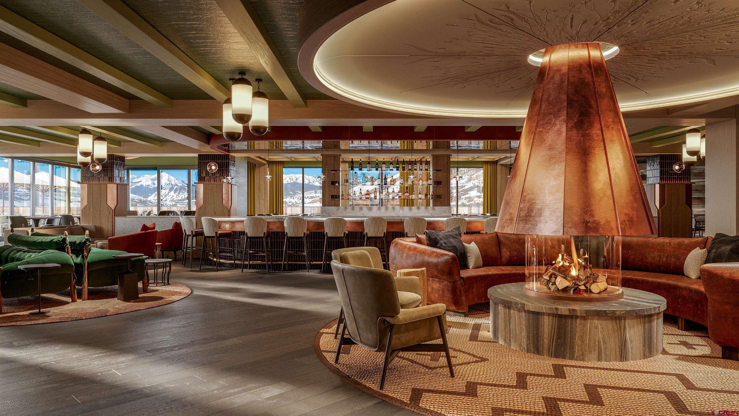 500 Gothic Road, Unit 431 Crested Butte, CO 81225 - Photo 8 of 19 a living room with patio furniture and a large window