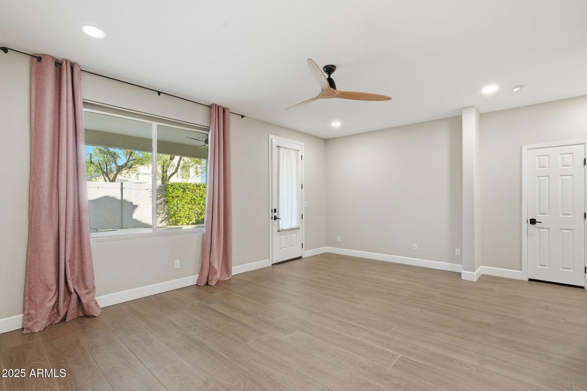 245 West Sagebrush Street Gilbert, AZ 85233 - Photo 23 of 62 a view of an empty room with a window