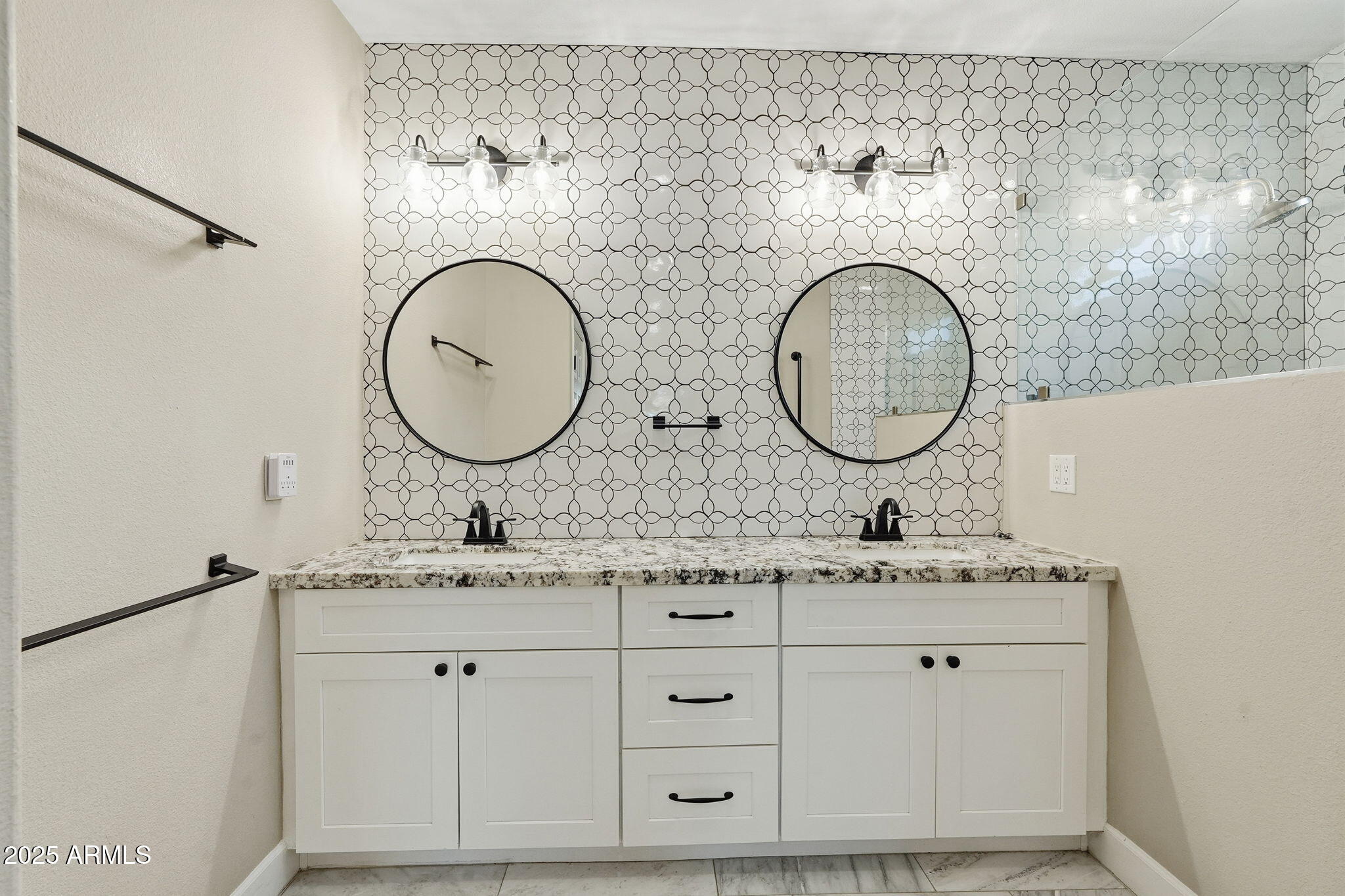 245 West Sagebrush Street Gilbert, AZ 85233 - Photo 26 of 62 a bathroom with a sink and a mirror