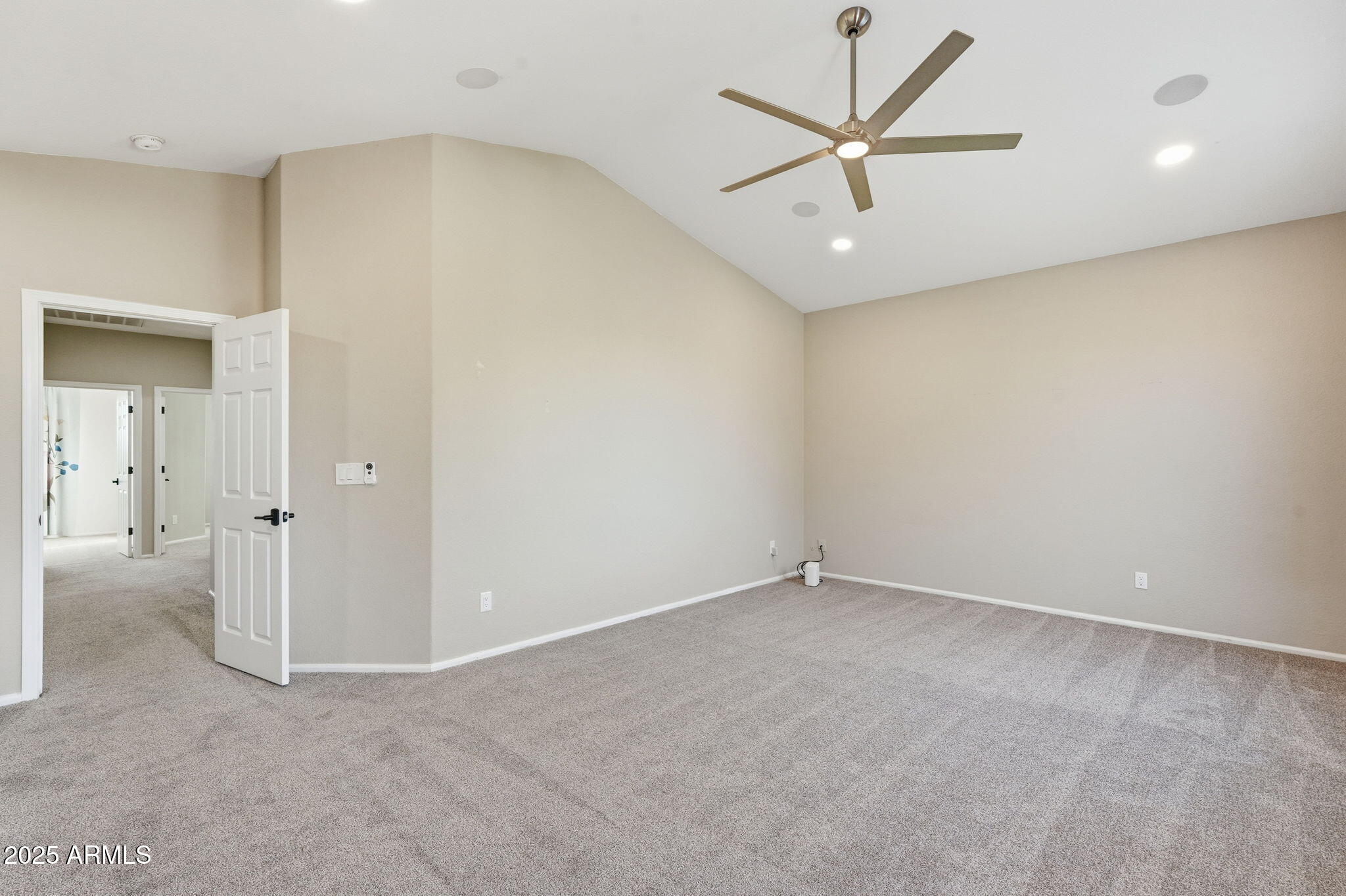 245 West Sagebrush Street Gilbert, AZ 85233 - Photo 33 of 62 an empty room with a ceiling fan and a window