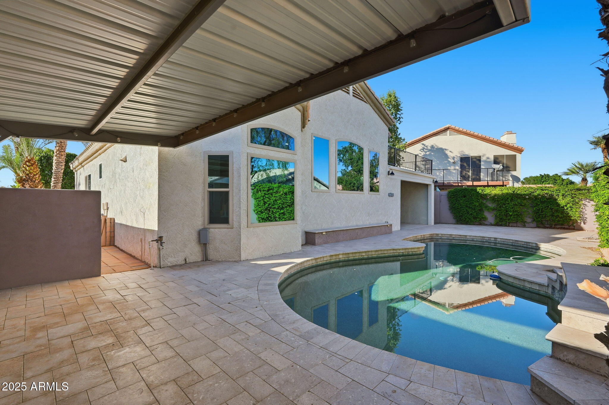 245 West Sagebrush Street Gilbert, AZ 85233 - Photo 50 of 62 a view of a house with backyard and sitting area