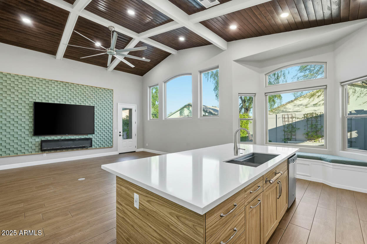 245 West Sagebrush Street Gilbert, AZ 85233 - Photo 9 of 62 a kitchen with a stove a sink and a refrigerator