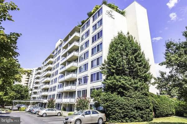 1301 South Arlington Ridge Road, Unit 406 Arlington, VA 22202 - Photo 1 of 27 a front view of a building