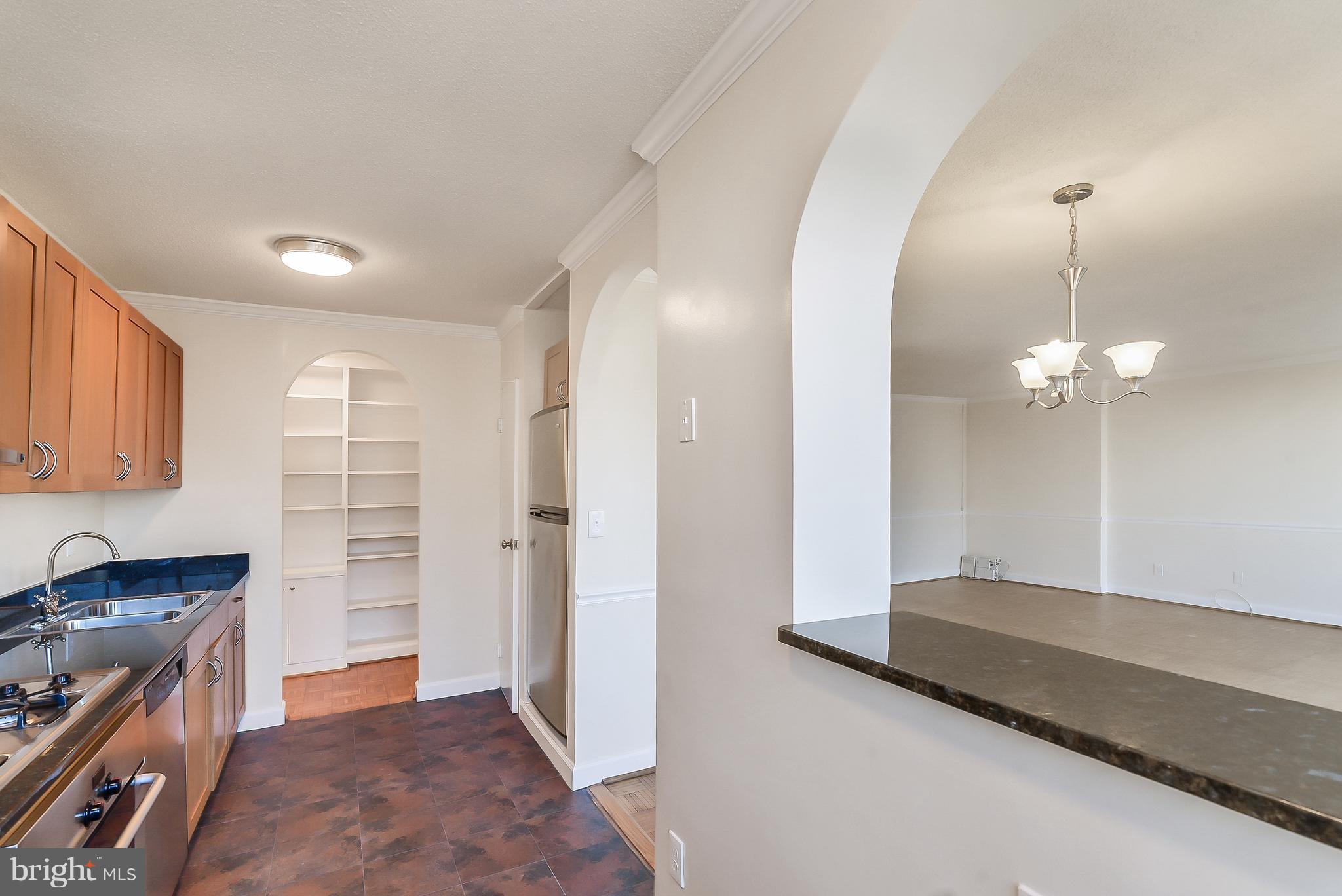 1301 South Arlington Ridge Road, Unit 406 Arlington, VA 22202 - Photo 7 of 27 a view of livingroom with kitchen