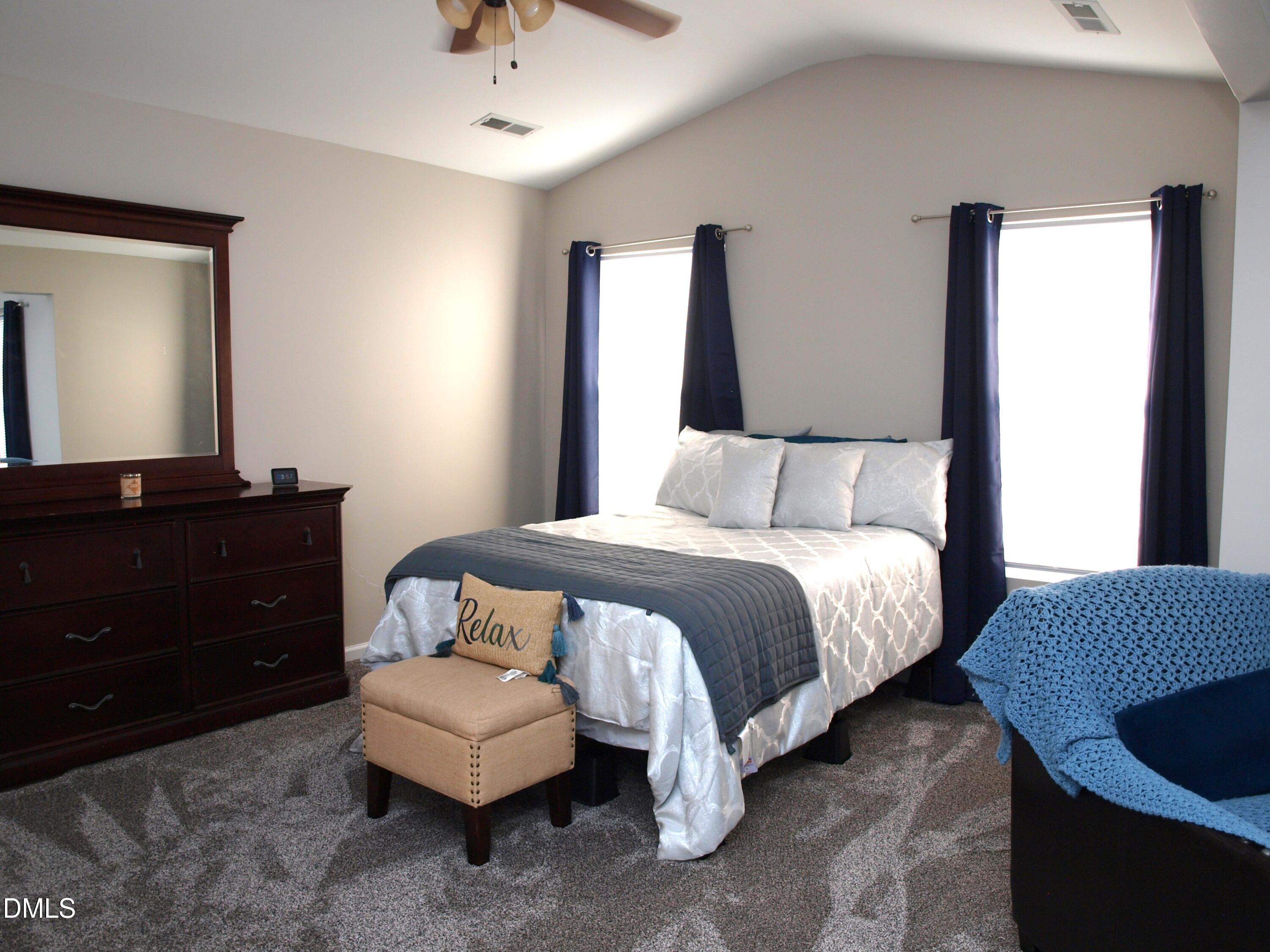 2019 Tennessee Road Durham, NC 27704 - Photo 11 of 21 a bedroom with a bed and a dresser