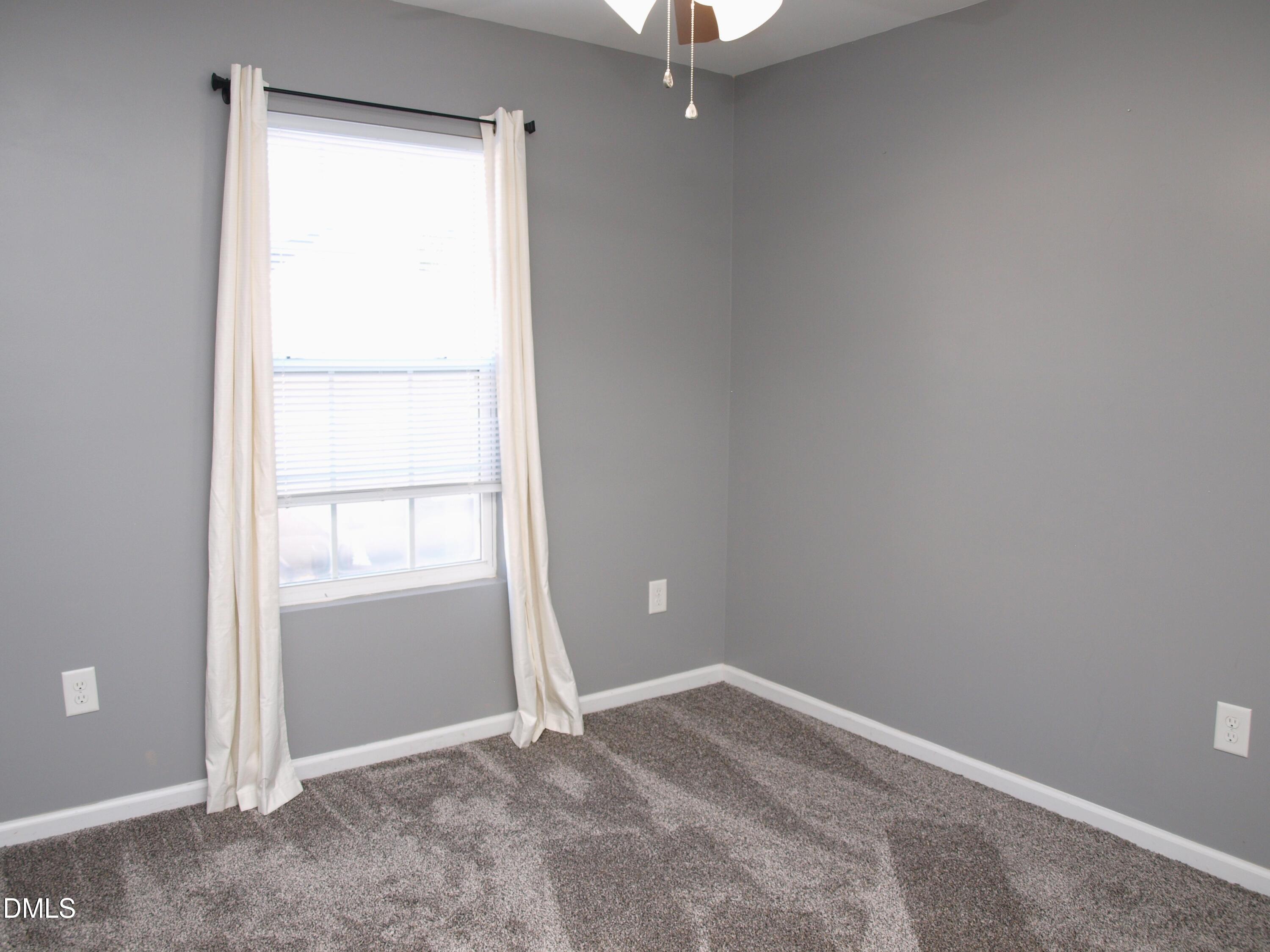 2019 Tennessee Road Durham, NC 27704 - Photo 16 of 21 an empty room with a window