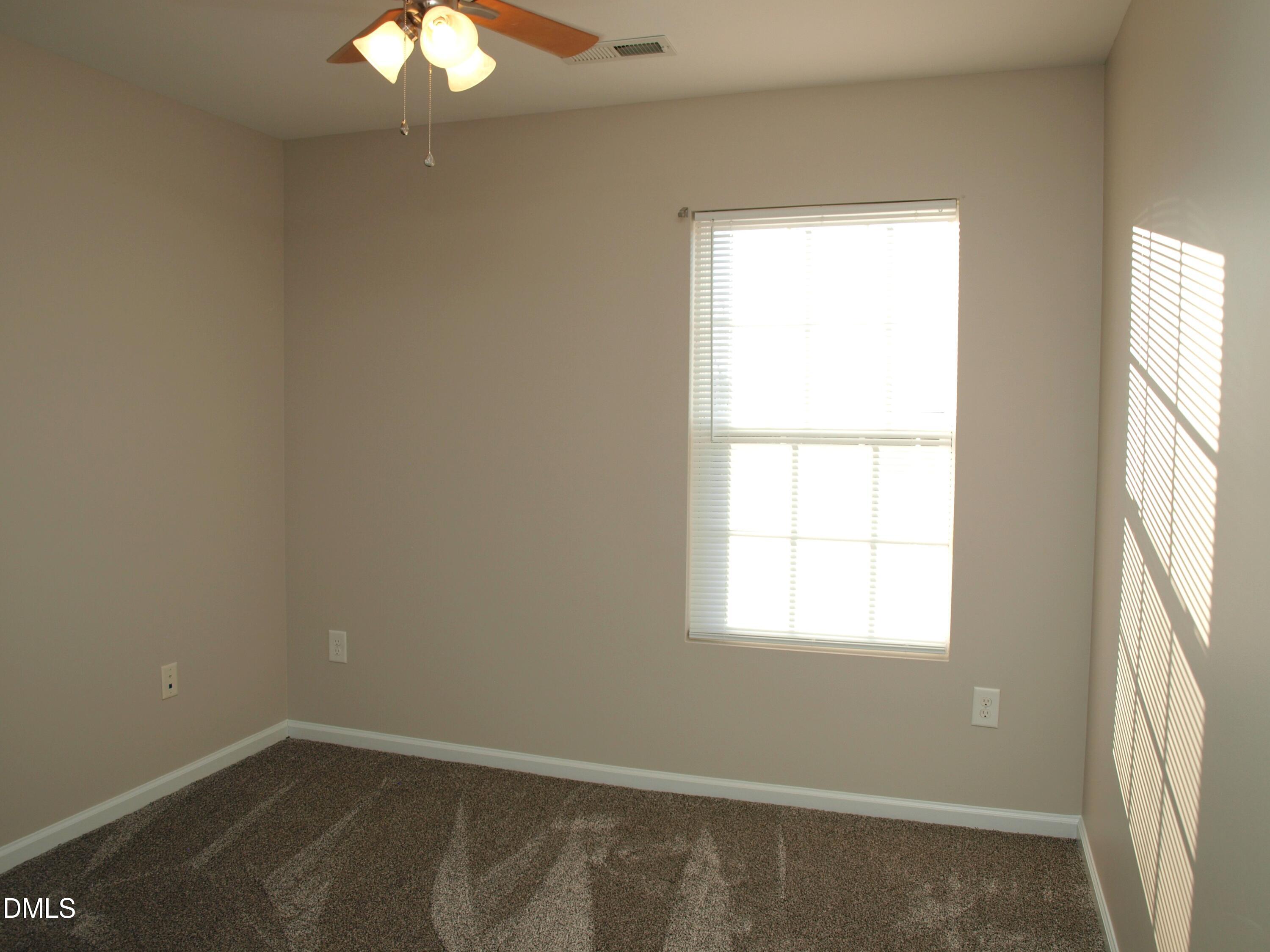 2019 Tennessee Road Durham, NC 27704 - Photo 18 of 21 an empty room with a window