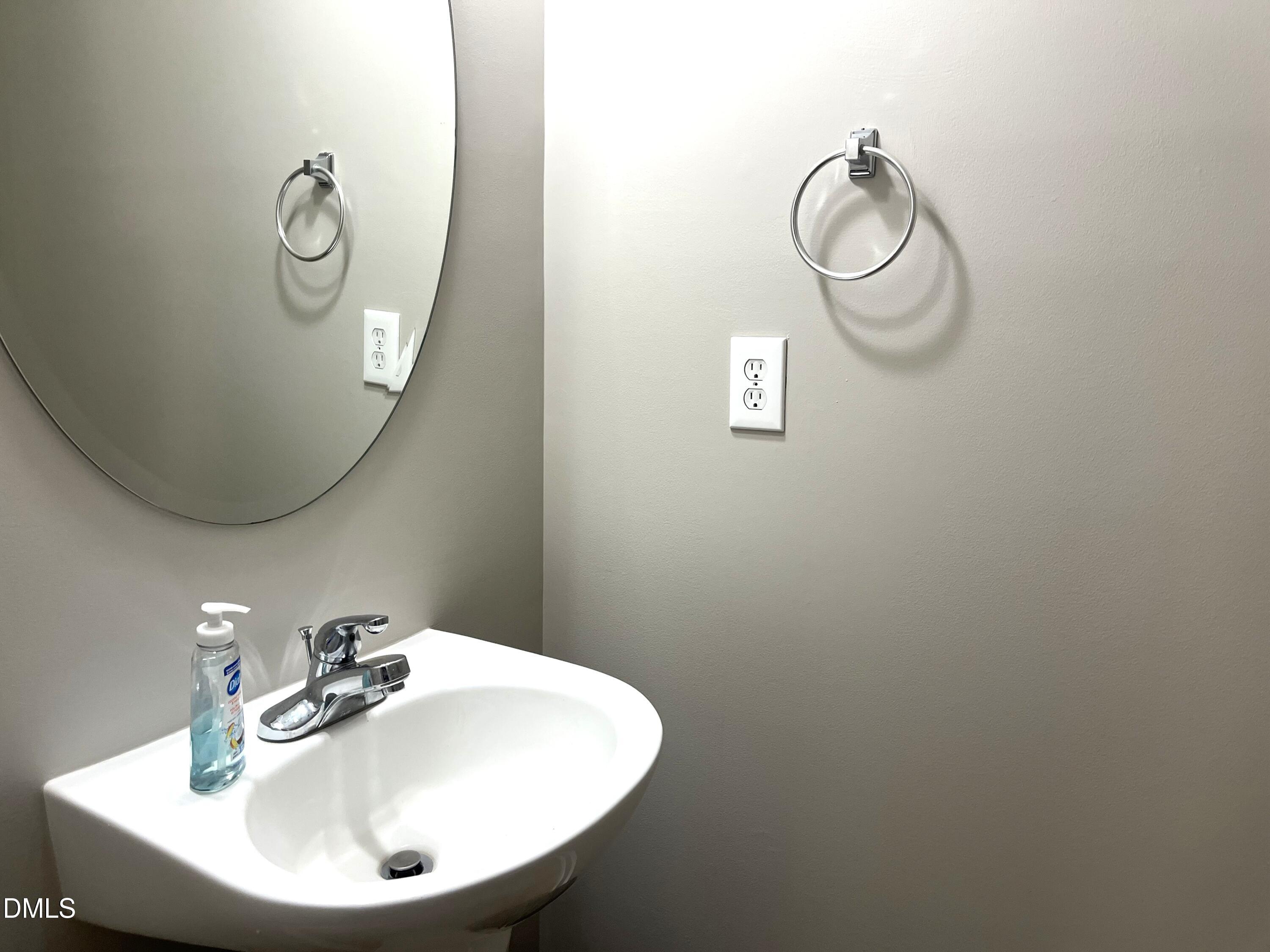 2019 Tennessee Road Durham, NC 27704 - Photo 19 of 21 a bathroom with a sink and a mirror