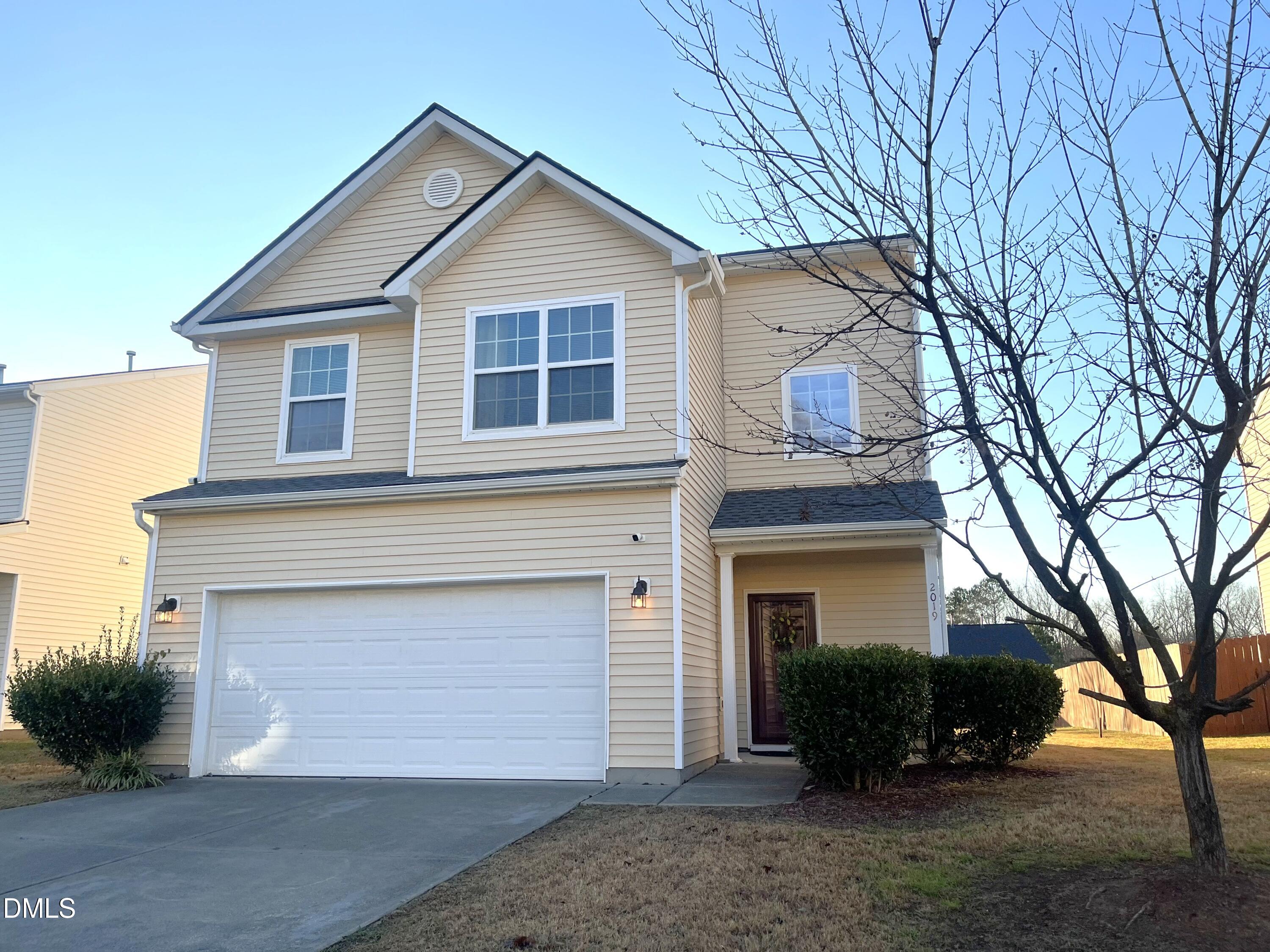 2019 Tennessee Road Durham, NC 27704 - Photo 2 of 21 a view of a house with a yard and large tree