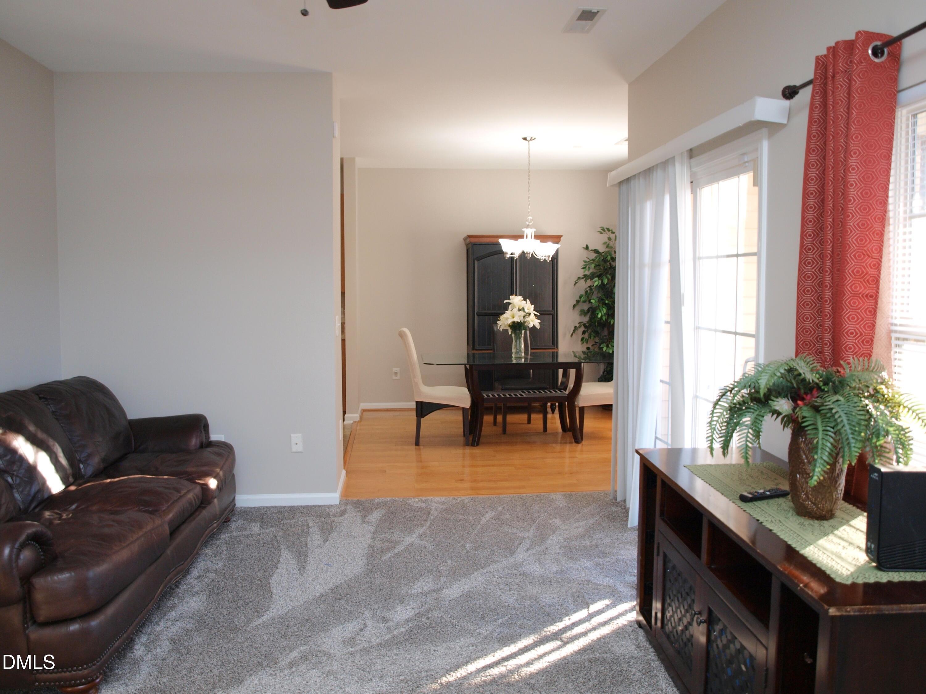 2019 Tennessee Road Durham, NC 27704 - Photo 4 of 21 a living room with furniture and a potted plant