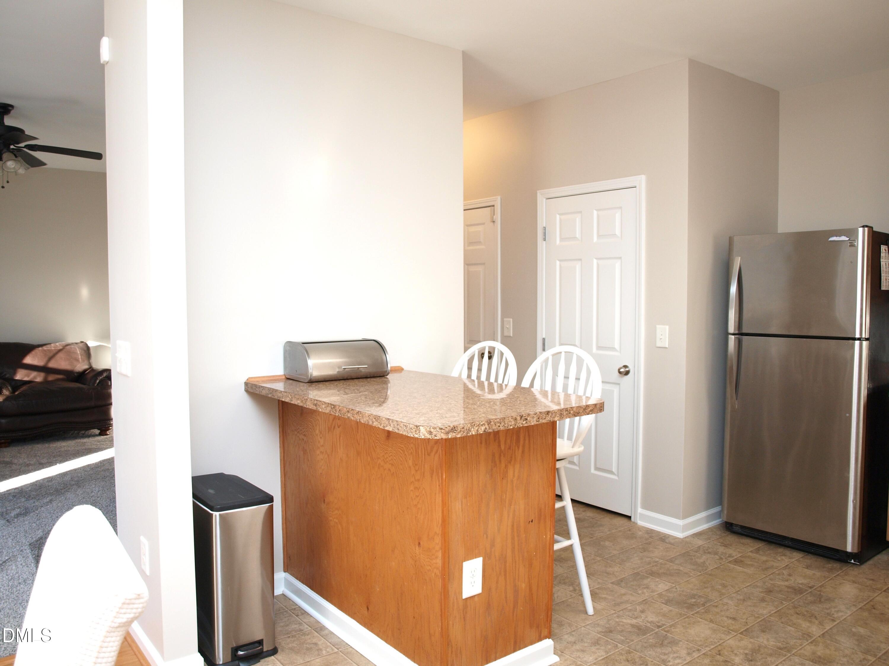 2019 Tennessee Road Durham, NC 27704 - Photo 9 of 21 a kitchen with granite countertop cabinets and stainless steel appliances