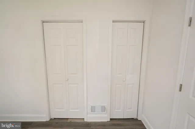 a bathroom with a toilet and a bathtub