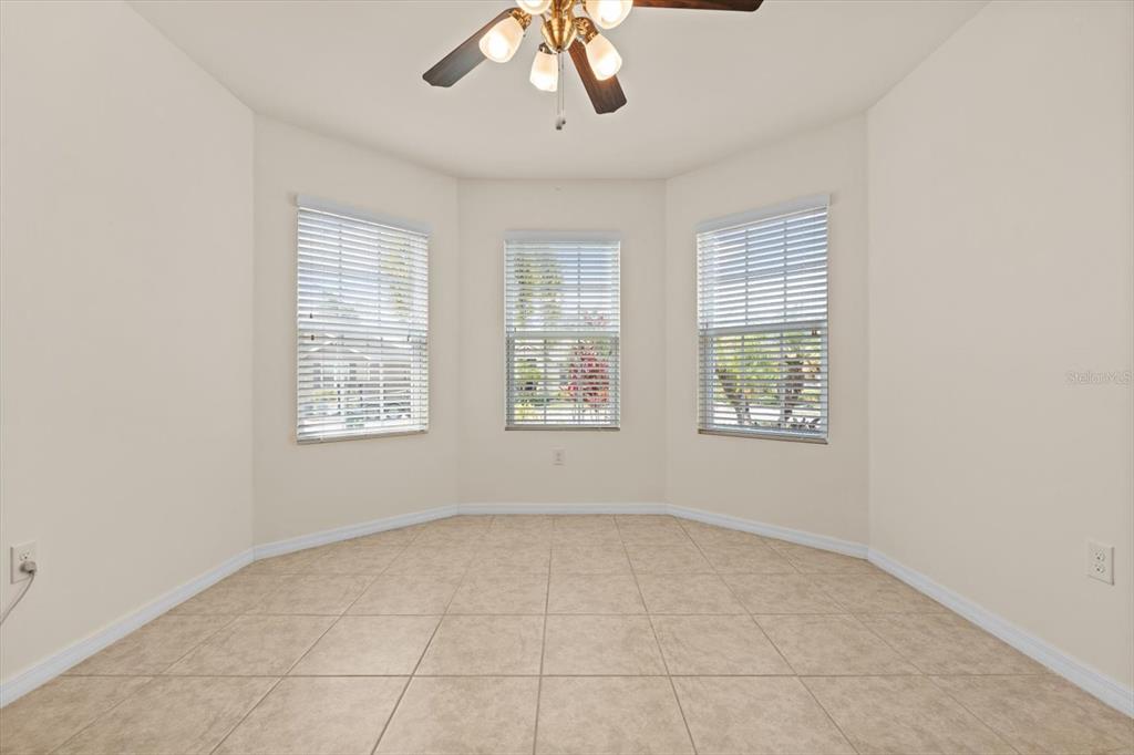8932 Excelsior Place Venice, FL 34293 - Photo 11 of 43 a view of an empty room with a window