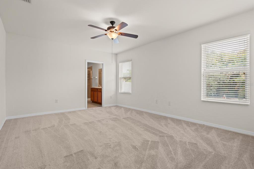 8932 Excelsior Place Venice, FL 34293 - Photo 16 of 43 a view of an empty room with a window