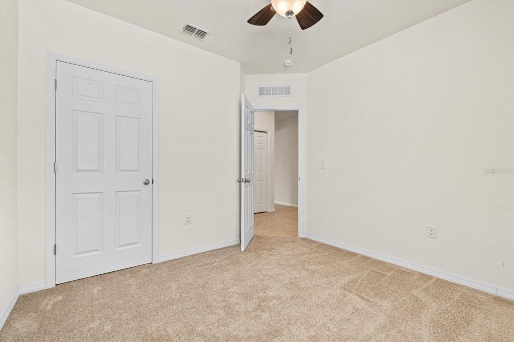 8932 Excelsior Place Venice, FL 34293 - Photo 23 of 43 wooden floor in an empty room