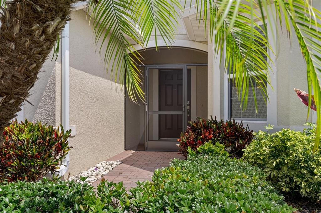 8932 Excelsior Place Venice, FL 34293 - Photo 3 of 43 an outdoor space with plants
