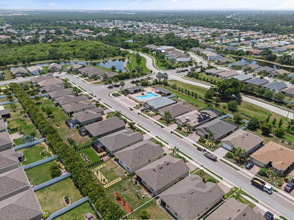 8932 Excelsior Place Venice, FL 34293 - Photo 37 of 43 an aerial view of a city with lots of residential buildings