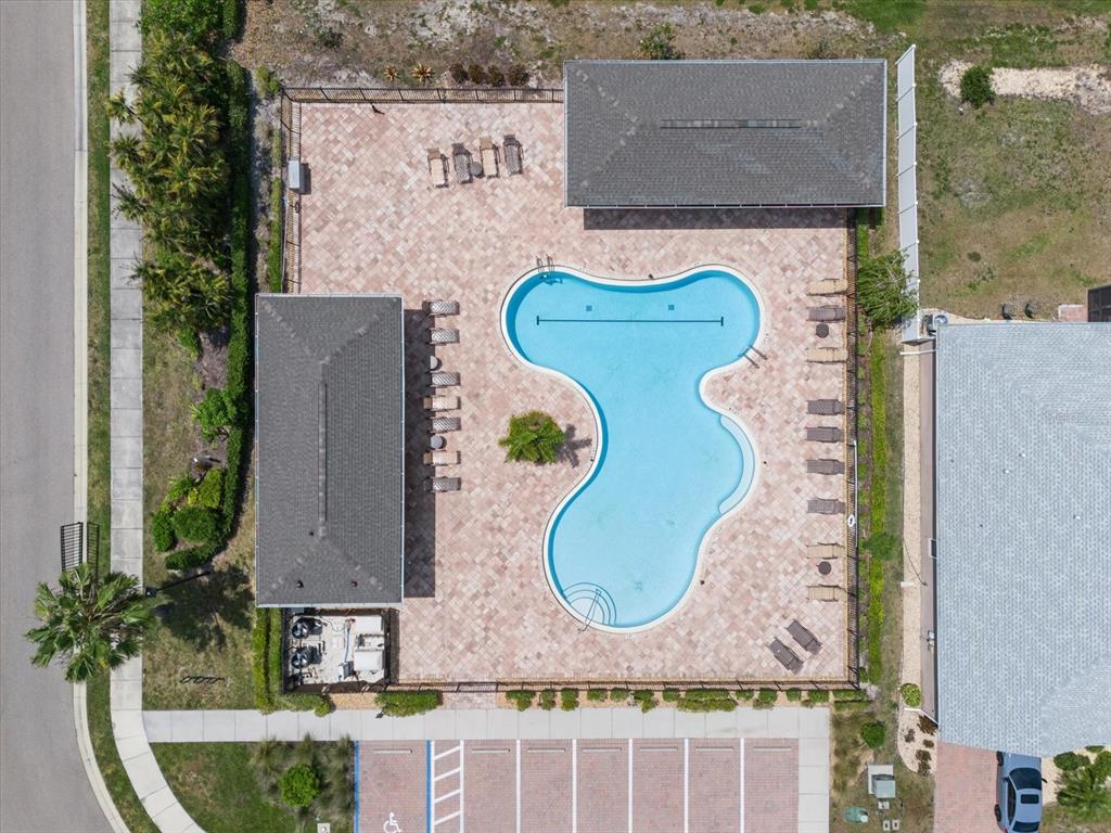 8932 Excelsior Place Venice, FL 34293 - Photo 41 of 43 an aerial view of a house with a swimming pool and a yard