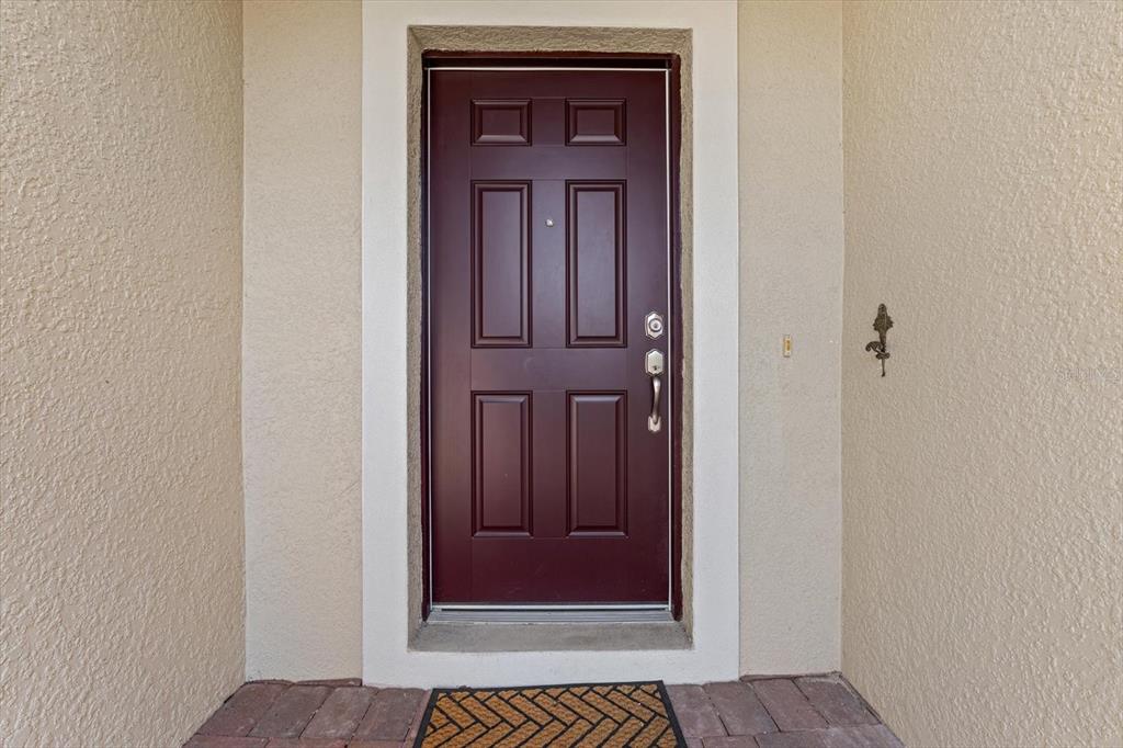 8932 Excelsior Place Venice, FL 34293 - Photo 5 of 43 a view of front door