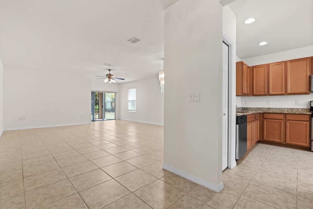 8932 Excelsior Place Venice, FL 34293 - Photo 6 of 43 a view of a kitchen with a sink and cabinets