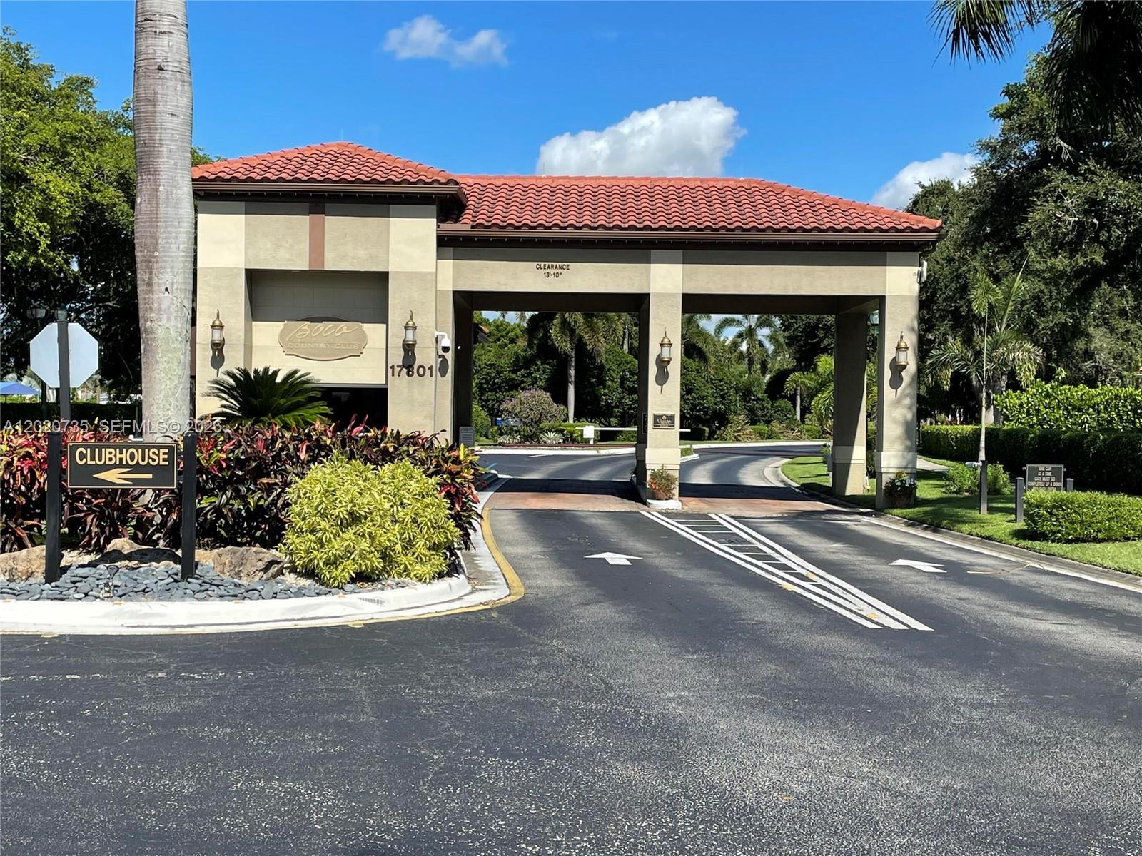 17244 Balboa Point Way Boca Raton, FL 33487 - Photo 29 of 66 a front view of a house with garden