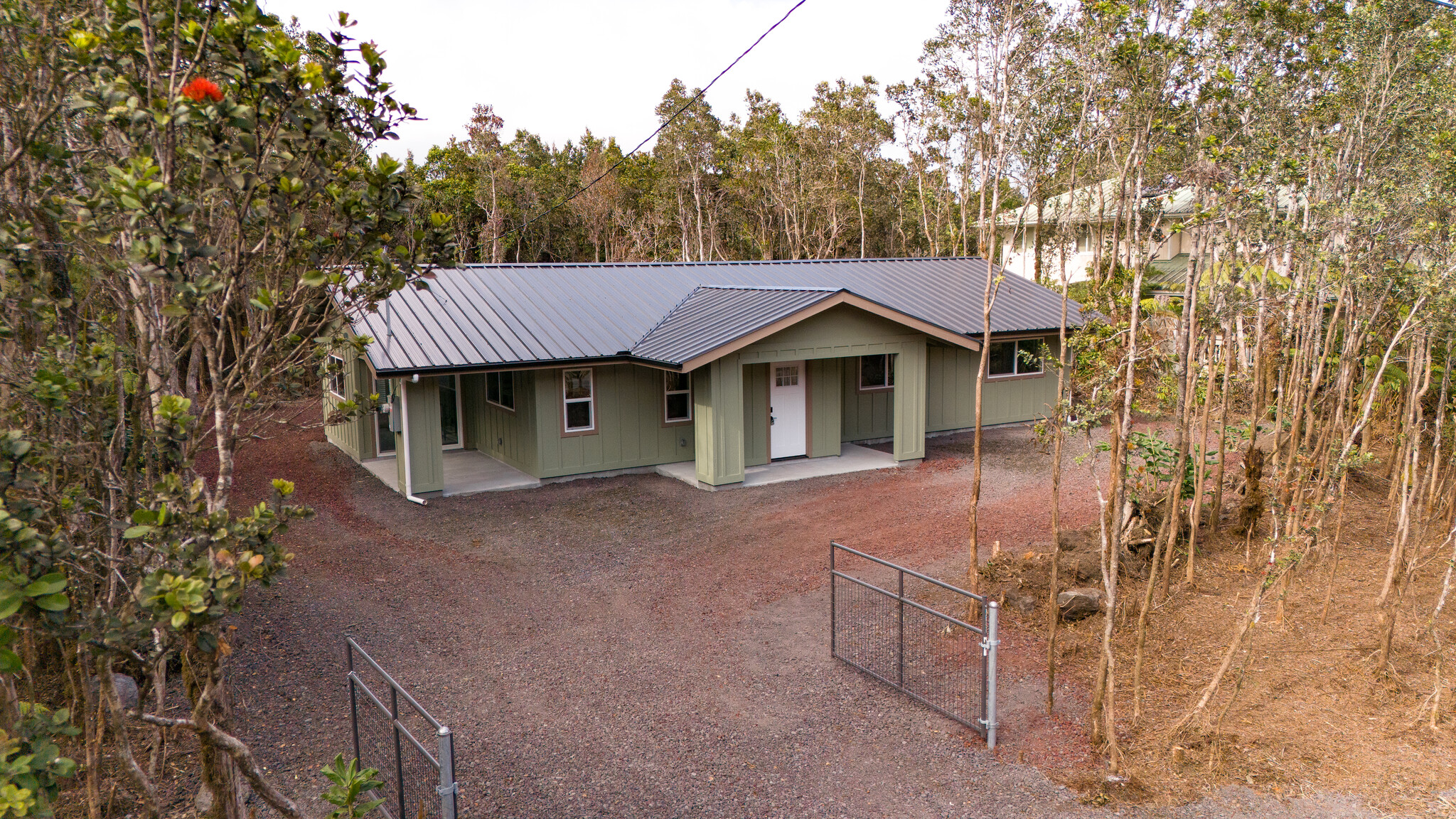 11-3790 9th Street Volcano, HI 96785 - Photo 1 of 30 a view of a house with a yard and tree s