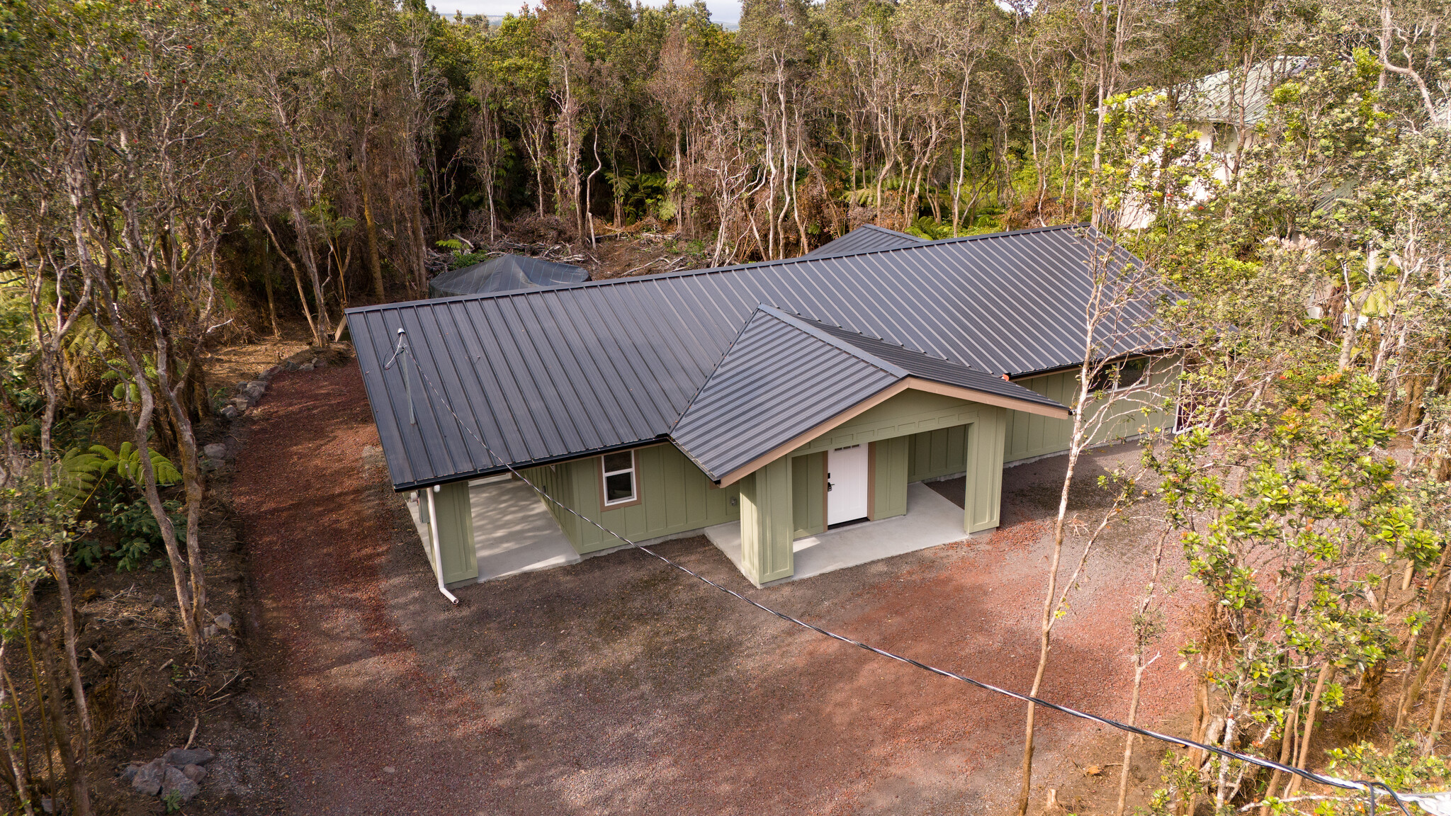 11-3790 9th Street Volcano, HI 96785 - Photo 27 of 30 a view of a house with a yard and wooden fence