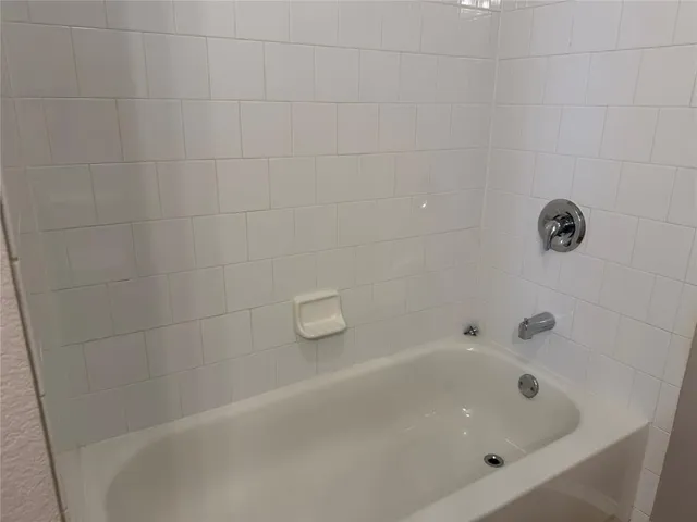 a close up of a bathtub