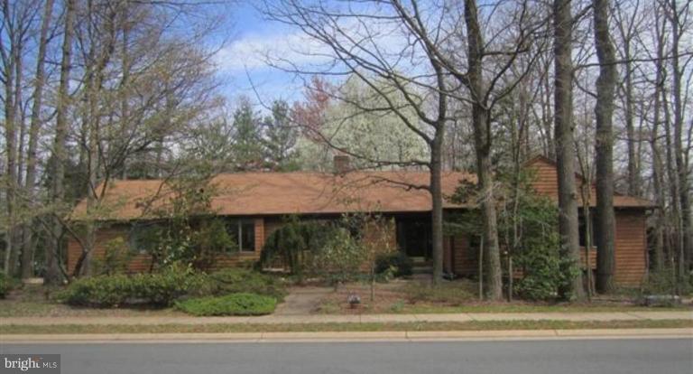 11597 Lake Newport Road Reston, VA 20194 - Photo 8 of 26 a view of a house with a yard and tree s