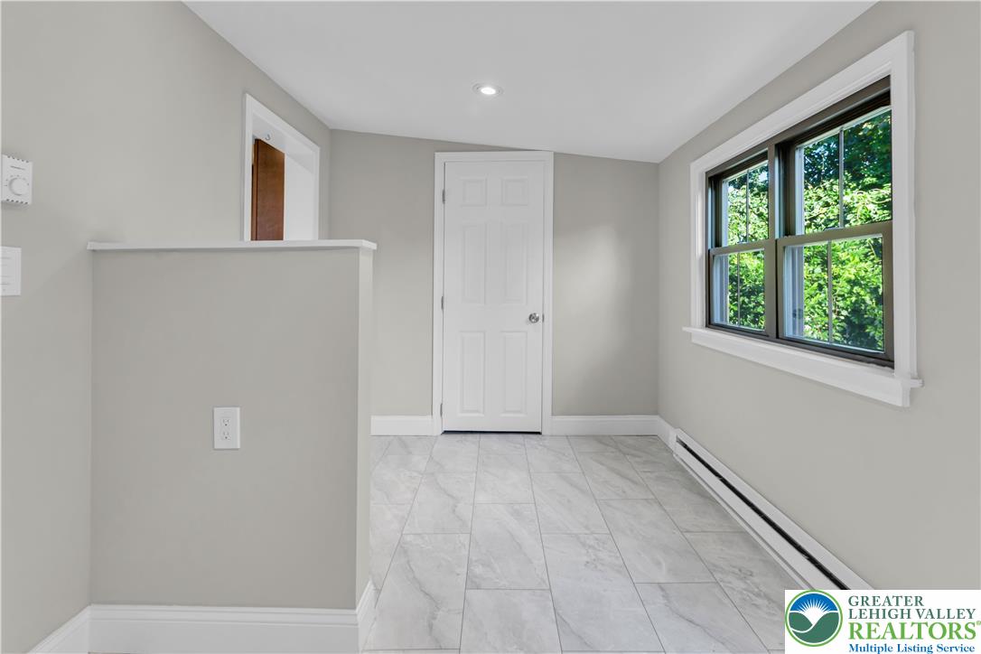 2246 2nd Street Wilson, PA 18042 - Photo 12 of 47 a view of an empty room with a window