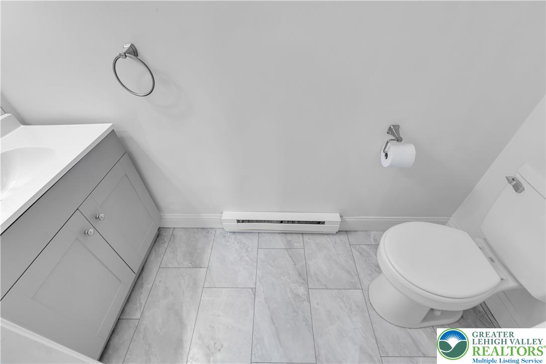 2246 2nd Street Wilson, PA 18042 - Photo 16 of 47 a bathroom with a toilet and a shower