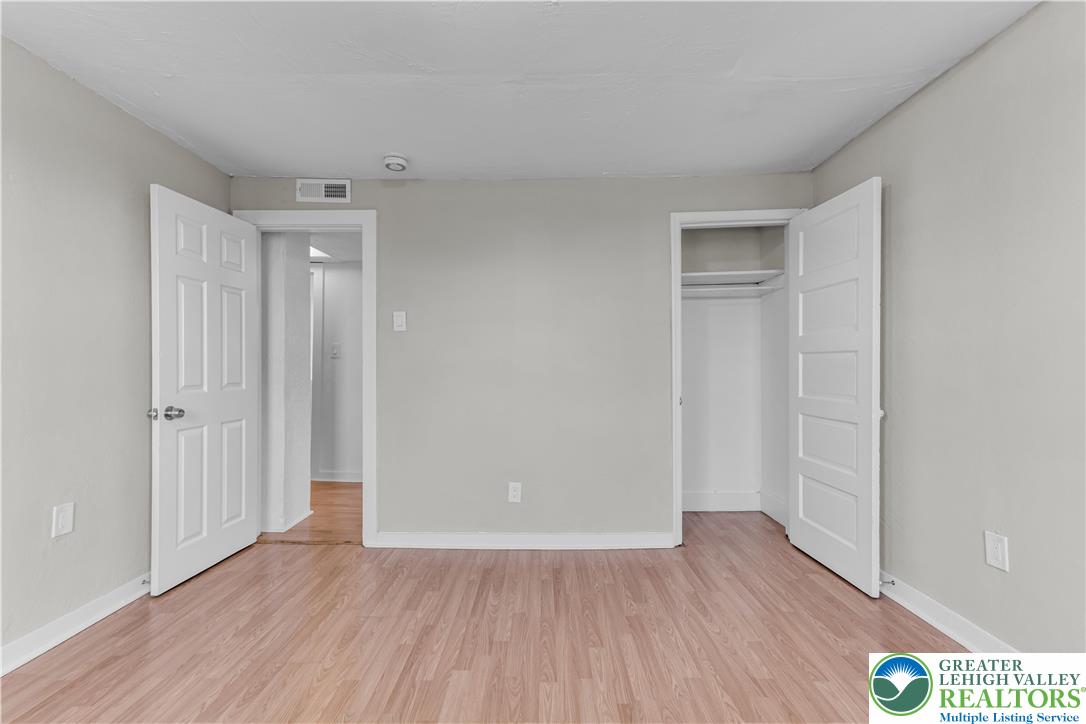2246 2nd Street Wilson, PA 18042 - Photo 22 of 47 a view of an empty room and wooden floor